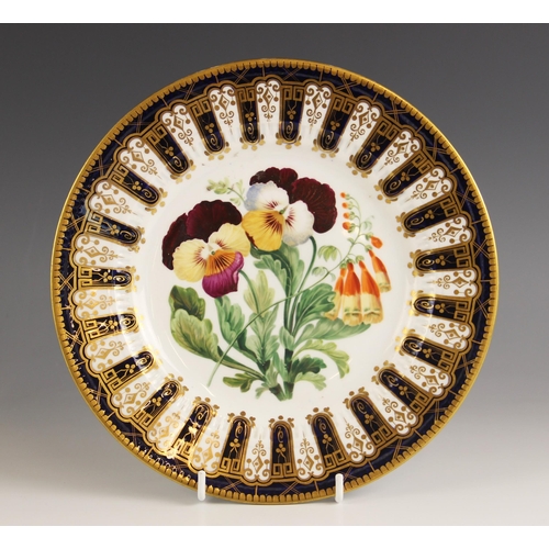 482 - A porcelain cabinet plate, probably Coalport, the well enamelled with floral sprays within a gilt an... 