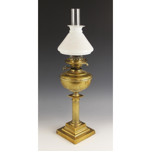 537 - A Victorian Duplex oil lamp, late 19th century, the  reeded Doric column on stepped square base, wit... 