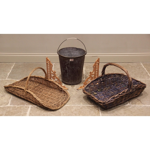 585 - Two florist wicket baskets, each with an overhead loop handle, the longest 80cm, along with a painte... 