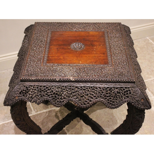 792 - An Anglo-Indian carved hardwood occasional table, late 19th/early 20th century, the square top with ... 