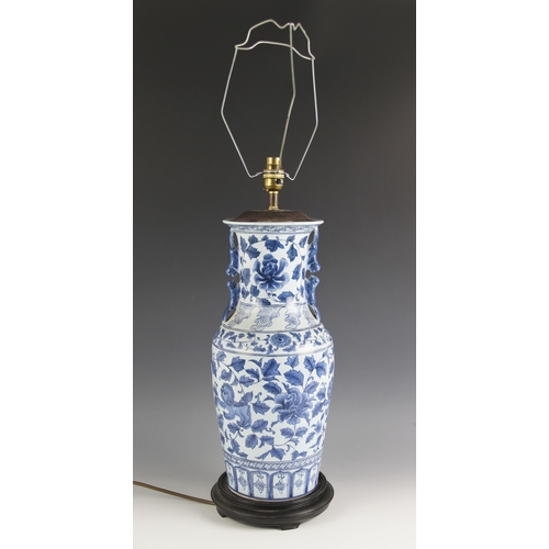 440 - A Chinese porcelain blue and white lamp base, 20th century, the baluster shaped vase decorated with ... 