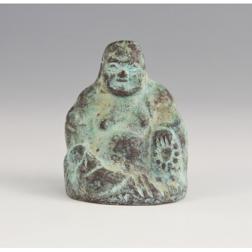 441 - A Chinese bronze figure of buddha, modelled in small proportions depicting the buddha seated, 6cm hi... 