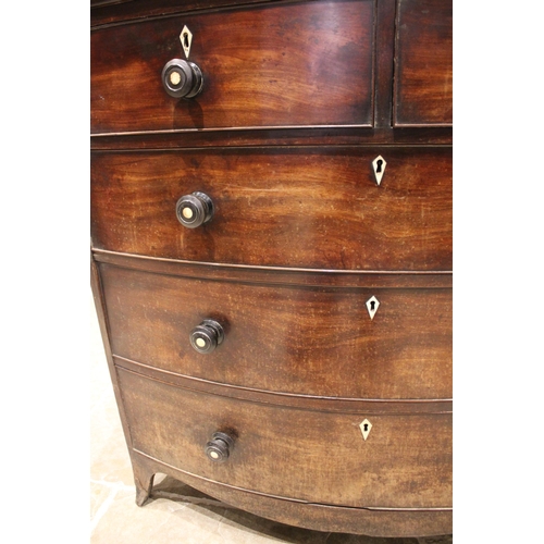 765 - An early 19th century mahogany bowfront chest of drawers, with an arrangement of two short over thre... 