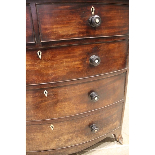 765 - An early 19th century mahogany bowfront chest of drawers, with an arrangement of two short over thre... 