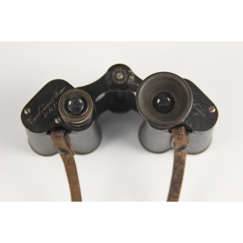 582 - A cased pair of Carl Zeiss Jena DRP Feldstecher Vergr 8 binoculars, early 20th century, retailed by ... 