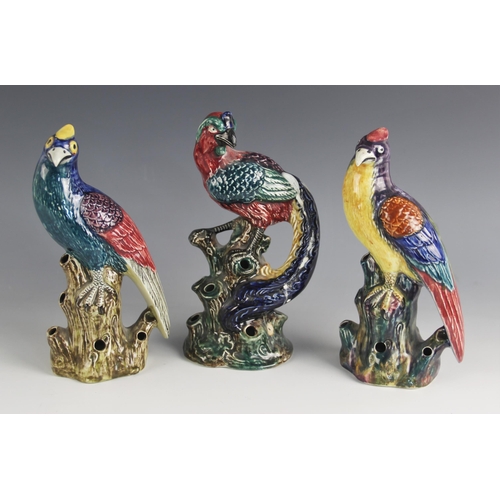 487 - Three Hancock & sons Art Deco exotic bird figure spill holders, each bird perched upon a rocky outcr... 