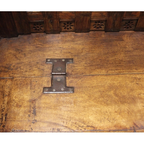 805 - An Indian hardwood box settle, 19th century and later, the panelled back board punctuated with pierc... 