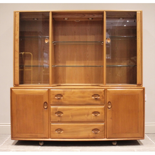 834 - An Ercol blonde elm glazed dresser/sideboard, mid 20th century, the upper section formed with open g... 