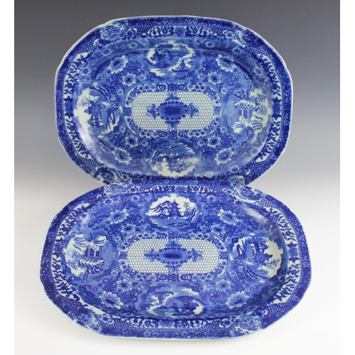 489 - A collection of blue and white meat plates, 19th century and later, comprising; a Willow pattern ova... 