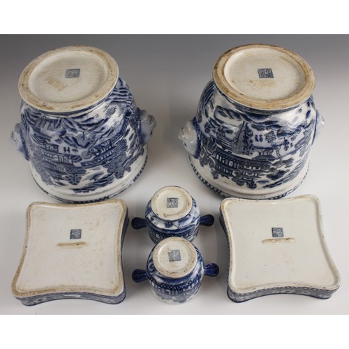 490 - A pair of Chinese craquelure glazed blue and white cache pots, 20th century, each of cylindrical for... 