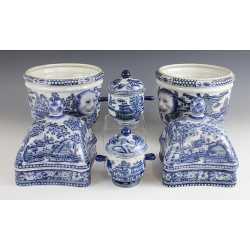 490 - A pair of Chinese craquelure glazed blue and white cache pots, 20th century, each of cylindrical for... 