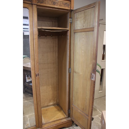 817 - An Arts & Crafts Gothic Revival ash inlaid wardrobe, attributed to Charles Bevan, possibly designed ... 