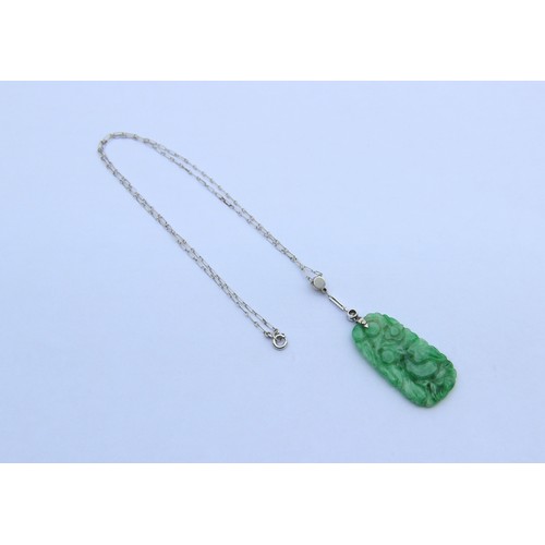 221 - An Art Deco jade and diamond necklace, the pearl and old cut diamond mounted white metal spacer susp... 