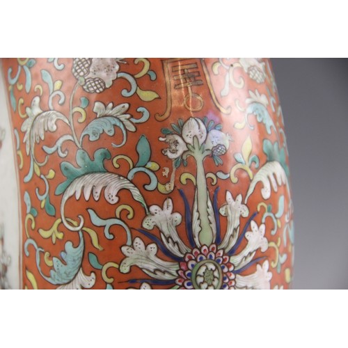 437 - A large pair of Chinese porcelain moon flasks, 19th century (Xianfeng / Tongzhi), each centrally dec... 