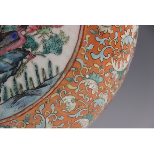 437 - A large pair of Chinese porcelain moon flasks, 19th century (Xianfeng / Tongzhi), each centrally dec... 