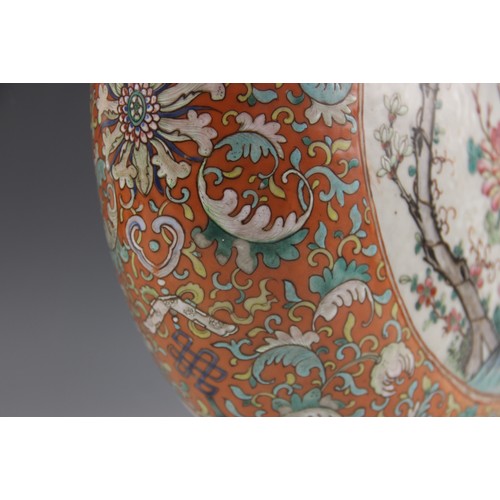 437 - A large pair of Chinese porcelain moon flasks, 19th century (Xianfeng / Tongzhi), each centrally dec... 