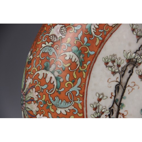 437 - A large pair of Chinese porcelain moon flasks, 19th century (Xianfeng / Tongzhi), each centrally dec... 