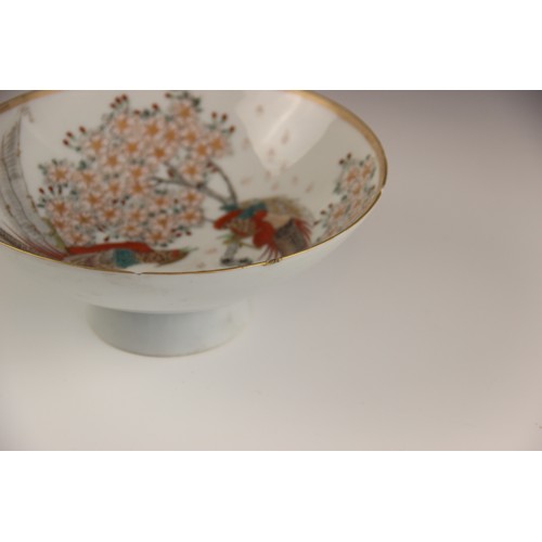 421 - A Japanese Kutani porcelain stem bowl, Meiji Period (1868-1912), signed to the underside, 18cm diame... 