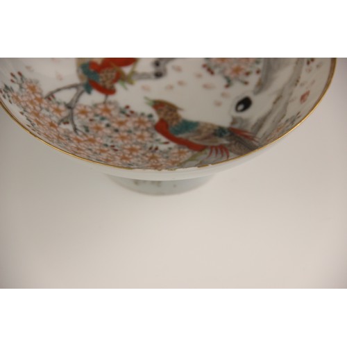 421 - A Japanese Kutani porcelain stem bowl, Meiji Period (1868-1912), signed to the underside, 18cm diame... 