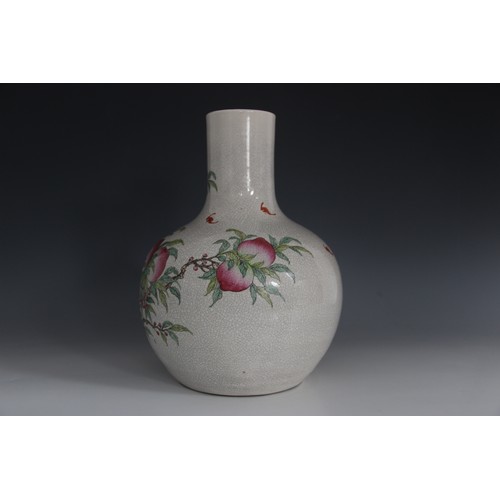 432 - A Chinese porcelain peach bloom vase, 20th century, the tianqiuping shaped globular vase externally ... 