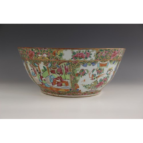 435 - A large Chinese porcelain Canton centre bowl, 19th century, the tapered circular bowl extensively de... 