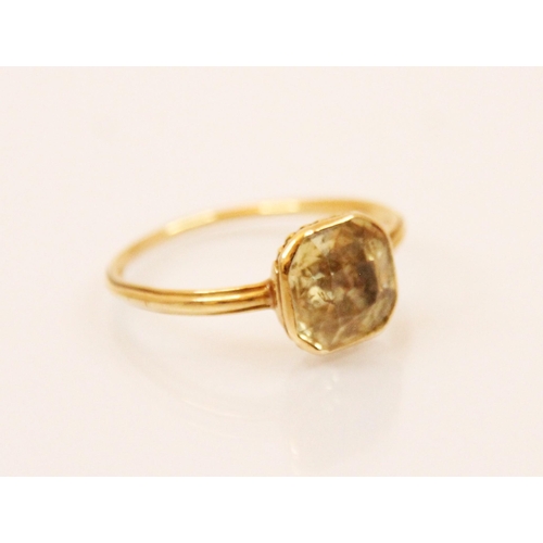 127 - A 19th century untested yellow sapphire ring, the radiant style cut yellow sapphire (possibly foiled... 