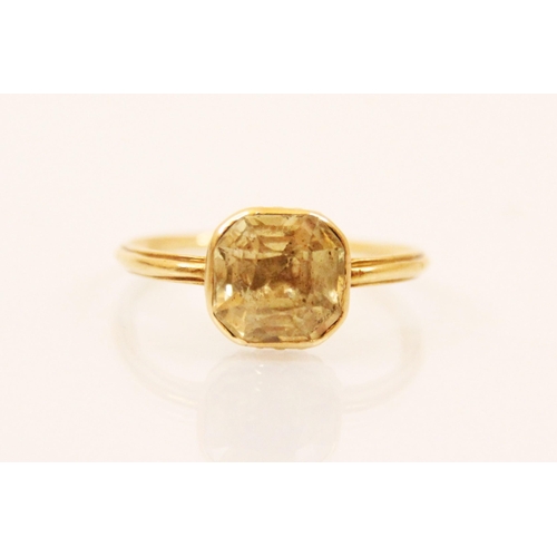 127 - A 19th century untested yellow sapphire ring, the radiant style cut yellow sapphire (possibly foiled... 