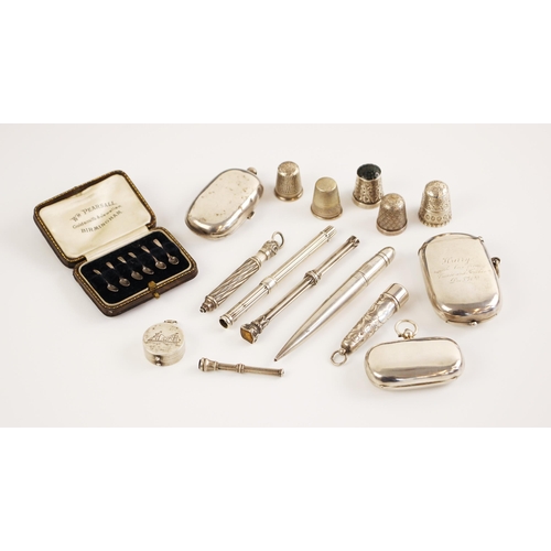 18 - A selection of silver and silver coloured items, to include a Victorian silver manicure set with sov... 