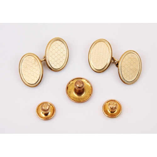 199 - A cased set of 9ct yellow gold cufflinks and dress studs, each link with engraved decoration and tra... 