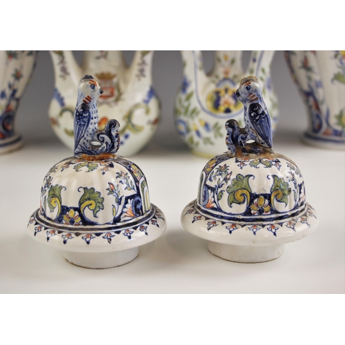 396 - A near pair of French faience jars and covers, 20th century, of lobed inverted baluster form, the co... 