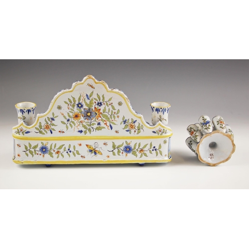 399 - A selection of French faience, 20th century, comprising: a desk stand with ogee shaped rim, the upst... 