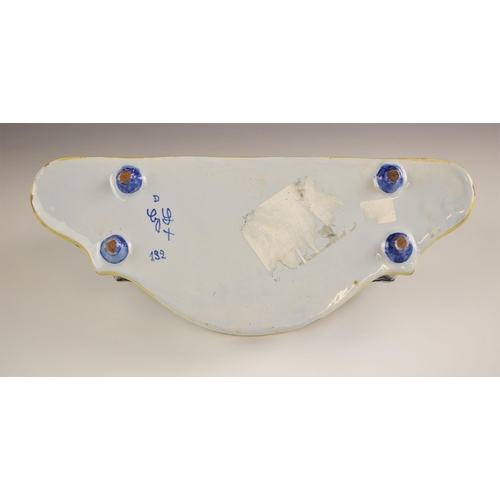 399 - A selection of French faience, 20th century, comprising: a desk stand with ogee shaped rim, the upst... 