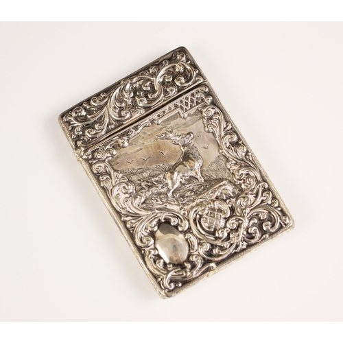 42 - An Edwardian silver card case, Crisford & Norris Ltd, Birmingham 1904, the rectangular case with emb... 