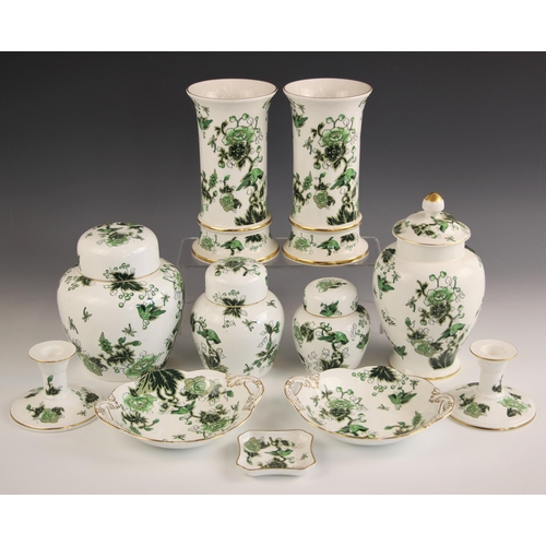 438 - A selection of Coalport porcelain in the 'Cathay' pattern, comprising: a graduated set of three ging... 