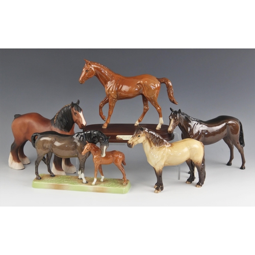 440 - Three Beswick horse models comprising: 'Mare and Foal' model number 1811, in brown and chestnut, des... 