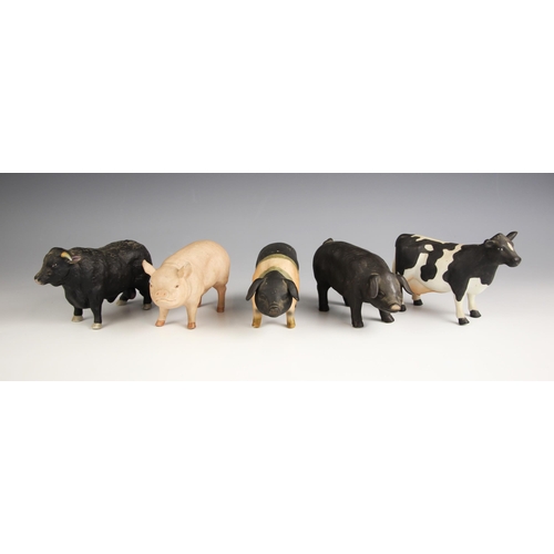 466 - Five porcelain farmyard animals, each naturalistically modelled, comprising: three pigs, 9cm high, 9... 