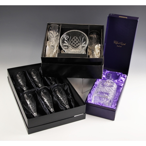 479 - A boxed set of six Royal Doulton cut crystal champagne flutes, each 22cm high, with a boxed set of t... 