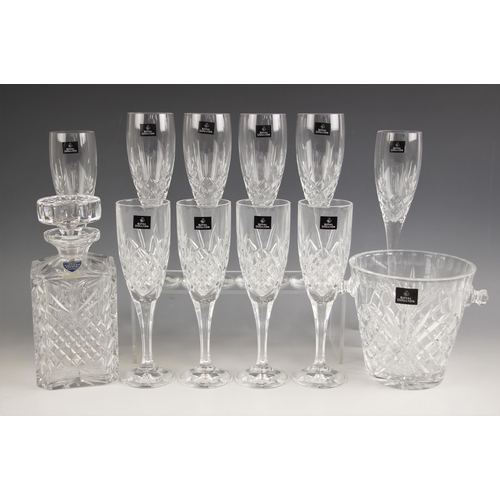 479 - A boxed set of six Royal Doulton cut crystal champagne flutes, each 22cm high, with a boxed set of t... 