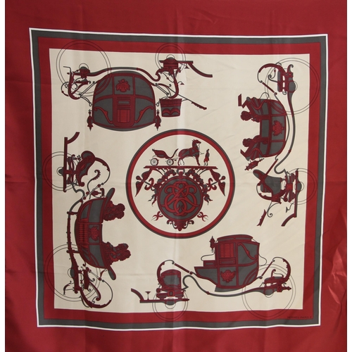 577 - An Hermes silk scarf, in the 'Ex Libris' pattern designed by Hugo Grygkar, in wine and grey, with ro... 