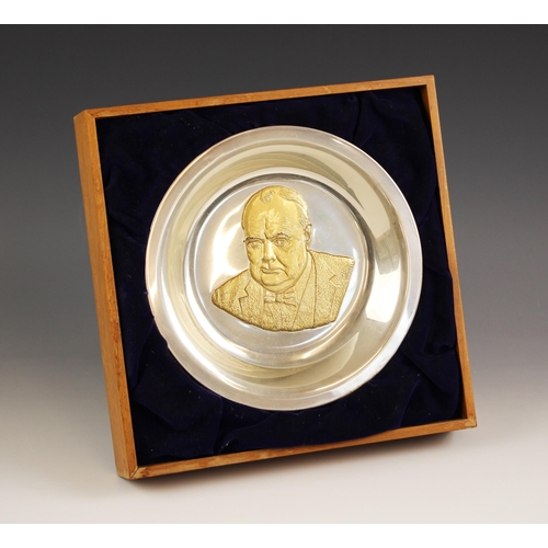 7 - A silver coloured ‘The Churchill centenary trust plate 1974’ the circular plate with gilt depiction ... 