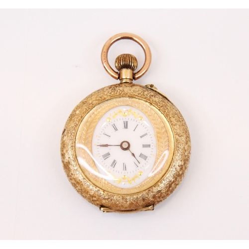 81 - A yellow metal ladies pocket watch, the circular oval dial with roman numerals and scroll decoration... 