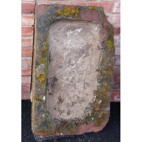 822 - A sandstone trough, 19th century, of rectangular shallow form, 23cm H x 91cm W x 54cm D (at fault)