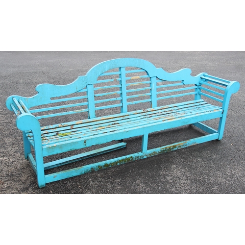 824 - A blue painted Lutyens style hardwood bench, of typical slatted form with an arched back rest, upon ... 