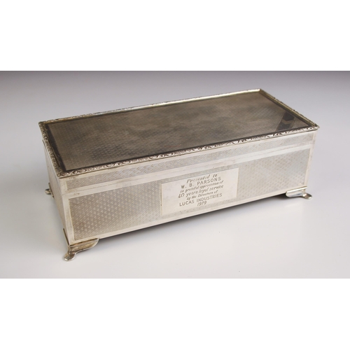 1 - A silver presentation box, Harman Brothers, Birmingham 1978, the rectangular box with engine turned ... 