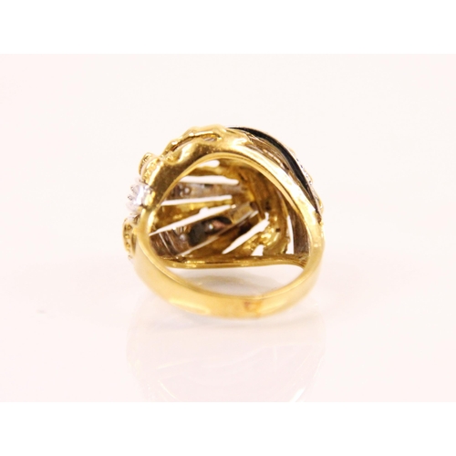 111 - A diamond and two tone bombe cocktail ring, the yellow and white metal striped design ring with plan... 