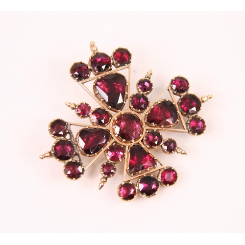 146 - A 19th century garnet set cross brooch/pendant, the pear and round cut garnets designed as a Maltese... 