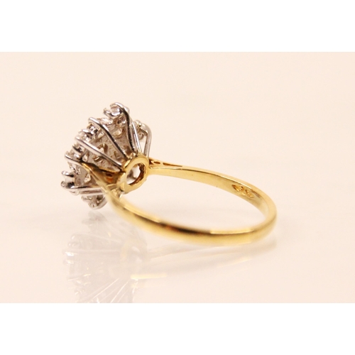 151 - A 20th century diamond cluster ring, the ring designed as a snowflake with thirteen round cut diamon... 