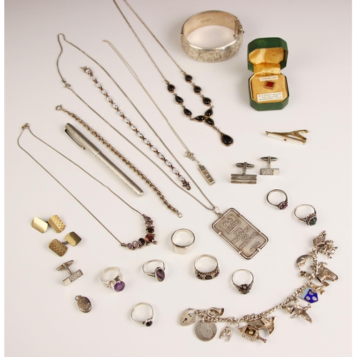 182 - A selection of silver jewellery, to include a Victorian style hollow bangle, 'MJ' Birmingham 1974, a... 