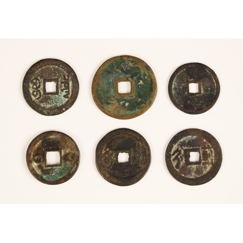 338 - A collection of six Chinese Ming dynasty and later cash coins (Qian), to include Han and Tang exampl... 