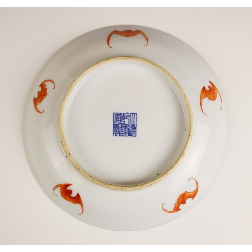 348 - A Chinese porcelain yellow ground dragon dish, Qianlong seal mark, the shallow circular dish central... 